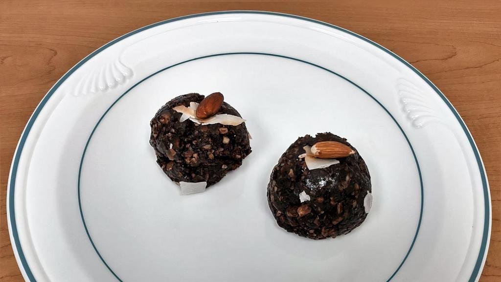 The Mint Chocolate Coconut Macaroons · Vegan and gluten free. Served as a pair.