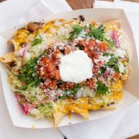 Loaded Nachos · Fresh made nacho chips with toppings of choice