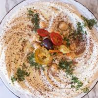 Hummus Side Plate · Gluten free and vegan. Served with grilled pita bread.