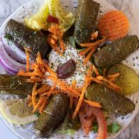Vegetarian Grape Leaves Side Plate · Gluten free and vegan. Vegetarian rolled grape leaves stuffed with rice, tomato, onions, par...