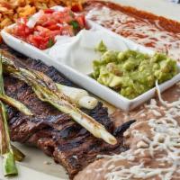 Tampiqueña · Grilled steak plus a cheese enchilada with pico, fresh guacamole, and sour cream. . It Inclu...