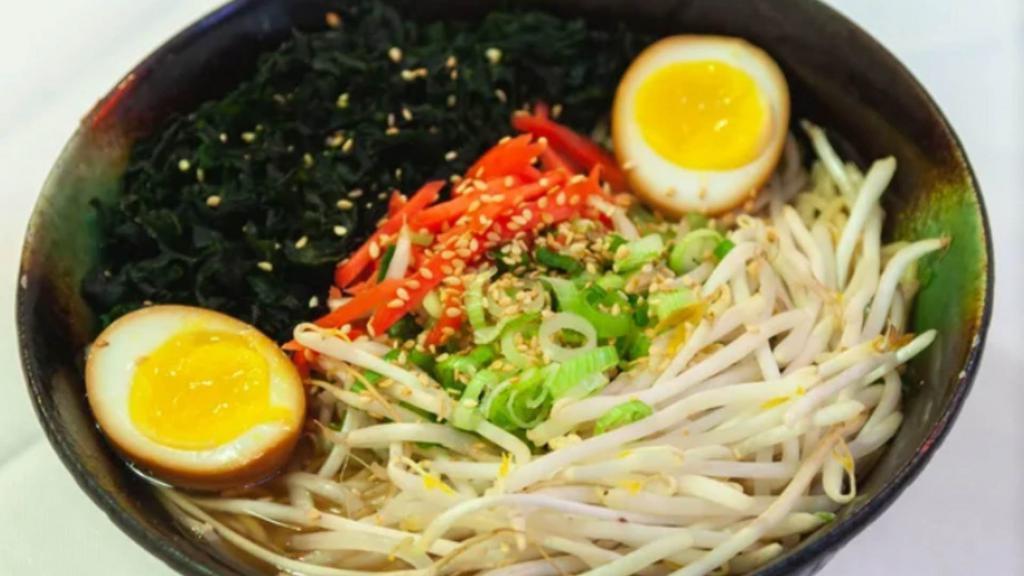 Wakame Ramen · Shoyu broth, normal wavy noodles, wakame seaweeds, bean sprouts, flavored egg, pickled ginger, sesame seeds, green onion.