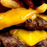 Double Pat · Double ½ lb. Certified angus beef patties, american cheese, lettuce, tomato, onion & pickle ...