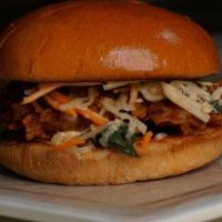 Crafty Asian · Spicy fried chicken, asian slaw on a brioche bun with french fries.
