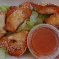 Crab Cheese Wonton (5 Pieces) · server with sweet & sour sauce
