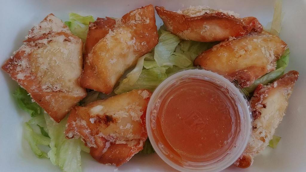 Crab Cheese Wonton (5 Pieces) · server with sweet & sour sauce