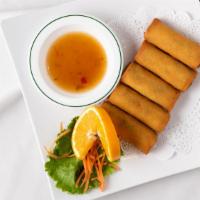 Spring Rolls · Chopped vegetables rolled in wheat wrapper and deep fried. Served with plum sauce.