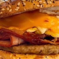Farmhouse Sandwich · Sausage, ham, bacon, 2 eggs and American cheese served on your choice of bread. For the HANG...