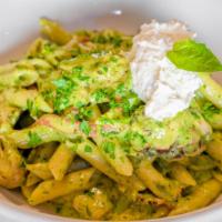Pesto Penne Pasta · Penne Pasta tossed in Pesto Cream sauce, served with Grilled Chicken and Roasted Red Bell Pe...