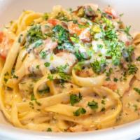 Pork Carbonara · Grilled Pork, fresh peas, 
 onion, bacon, tomato sautéed with garlic white and tossed in a p...