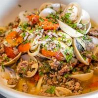 Clams And Fennel Sausage · Clams, fennel sausage, fresh tomato, basil, garlic and oregano tossed with linguine with a d...