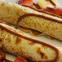 Panqueques  · Argentinian pancake filled with dulce de leche (milk caramel) banana ans strawberry