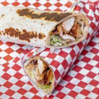 Chicken Saj · Chicken shawarma, hummus, lettuce, tomatoes, pickles, fresh onions, topped with house garlic...