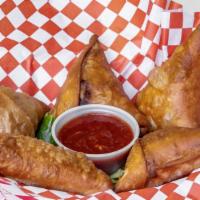 Beef Samosa · 5 pieces of Ground beef with spices put in the pocket of dough then fried to a perfect crisp...