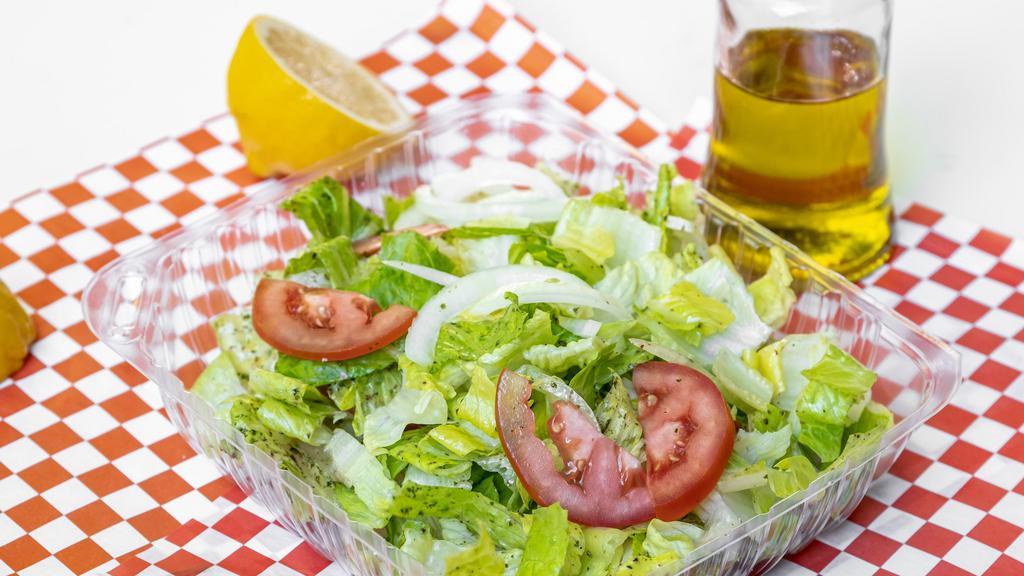 Middle Eastern Salad Plate · Chopped romaine lettuce onions tomatoes dried mint with the special house dressing.