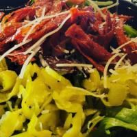 Italian Salad · Mixed greens, crispy pepperoni, red onion, kalamata olives, banana peppers, pepperoncini, Pa...