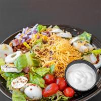 Chef Salad · Romaine lettuce, tomatoes, red onion, ham, hard boiled egg, bacon bits, Cheddar cheese serve...