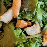 Side Salad · A simple mixed green salad with croutons. Choice of house, oil & vinegar, or ranch dressing.