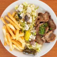 Greek Plate · Greek salad, French fries, gyro meat, side of Tzatziki sauce, and warm pita bread.
