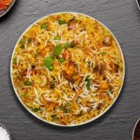 Vegetable Biryani For Days · Spiced seasoned vegetables cooked with Indian spices and basmati rice. Served with house rai...