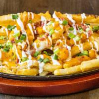 Loaded 414 Fries · Our amazing battered fries, smothered in chipotle cheese sauce and melted mozzarella, topped...