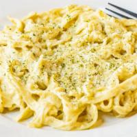 Alfredo. · Scratch made fettuccini noodles with house made creamy alfredo sauce. Add grilled chicken fo...