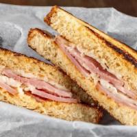 Adult Grilled Cheese · 3 cheese blend with ham. Served with fries