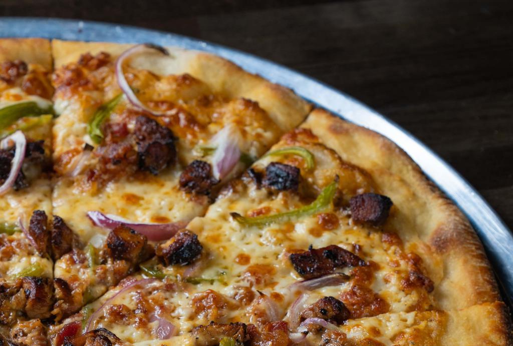 Arizona Pizza · Hot ranch base, grilled chicken, bacon, onion, green peppers, and garlic.
