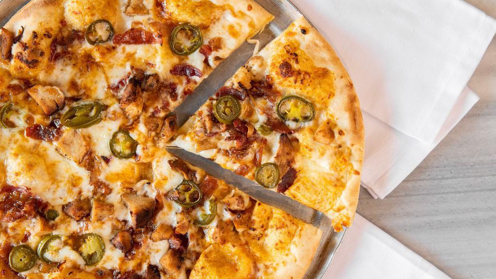 Spicy Bbq Pizza · BBQ sauce base, grilled chicken, bacon, and jalapeno.