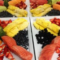 The Seasonal Fruit Platter · Seasonal fresh-cut fruits include berries and melons. Served with house-made french dipping ...
