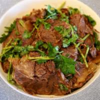 Spicy Sliced Beef Shank 凉拌麻辣牛肉片 · Beef shank stewed and sliced, cold served with spicy sauce