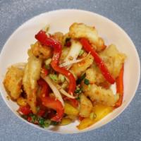 Fried Calamari 椒盐鱿鱼 · Fried spicy calamari with salt and black pepper.