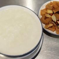 Plain Porridge 白粥 · White rice oatmeal with crispy crackers.