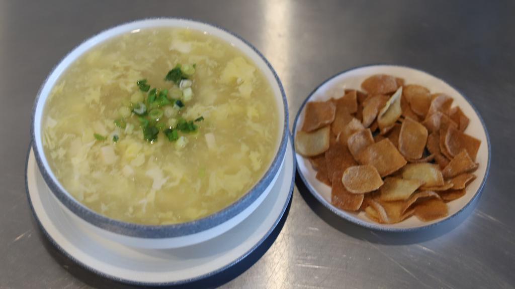 Seafood Tofu Soup 海鲜豆腐汤 · Seafood soup with tofu.