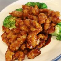 Orange Chicken 陈皮鸡 · Sweet and sour sauced chicken tender with steamed broccoli.