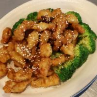 Sesame Chicken 芝麻鸡 · Sweet sesame sauced chicken tender with steamed broccoli.