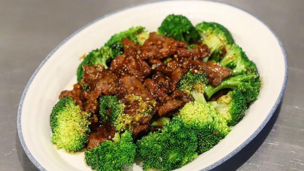 Broccoli Beef 西兰花炒牛肉 · Beef tenderloin slices stir-fried with soy sauce and come with steamed broccoli.