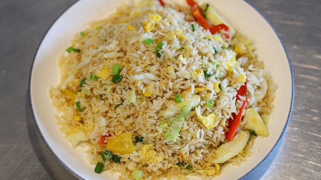 Veggie Fried Rice 菜炒饭 · White rice stir-fried with veggies and egg.