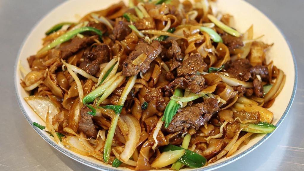 Beef Chow-Fun 牛肉炒河粉 · Wide rice noodle stir-fried with beef tenderloin slices and veggies.