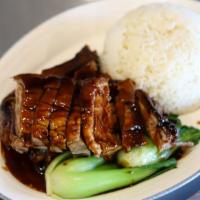 Roast Duck 烧鸭饭 · Roast duck chops glazed with soybean sauce and comes with white rice.
