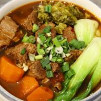 Taiwan Beef Shank Soup Noodle 台式红烧番茄牛肉面 · Stewed beef shank chops with house spice, onion, and tomato. Comes with buk-choy and carrots...