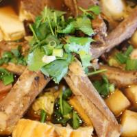 Bak Kut Teh(Pork Bone) Hot Pot 肉骨茶锅 · Herb stewed pork bone in a hot pot with fish balls, enoki mushroom, ham, tofu, veggies, and ...