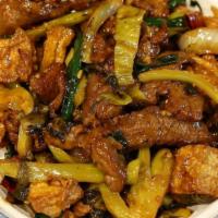 Spicy Pickle Tofu Beef 酸菜豆腐牛柳 · Beef tenderloin slices stir-fried with Chinese pickles, tofu, and onion slices. Light Spicy.