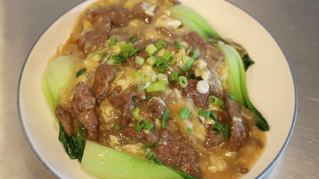 Egg Beef Pasted Chow-Fun 滑蛋牛河 · Chow-fun pasted with stir-fried beef tenderloin slices and egg.