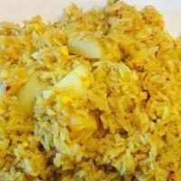 Curry Fried Rice · Egg, pineapple, tomato, onions, coconut milk and yellow curry powder.