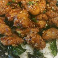 Allan Special · Crispy chicken on a bed of fried Thai basil leaves with green onions and black pepper in swe...