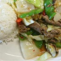 Ginger Delight · Stir-fried with fresh ginger, mushrooms, bell pepper, cabbage, onions and garlic. Served wit...
