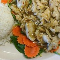 Lemon Grass · Sautéed with lemon grass and garlic, on a bed of fresh spinach and steamed carrots. Served w...