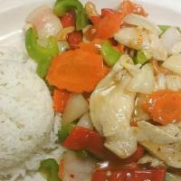Cashew Nut · Stir-fried with roast cashews, carrots, bell pepper, onion and garlic. Served with rice.
