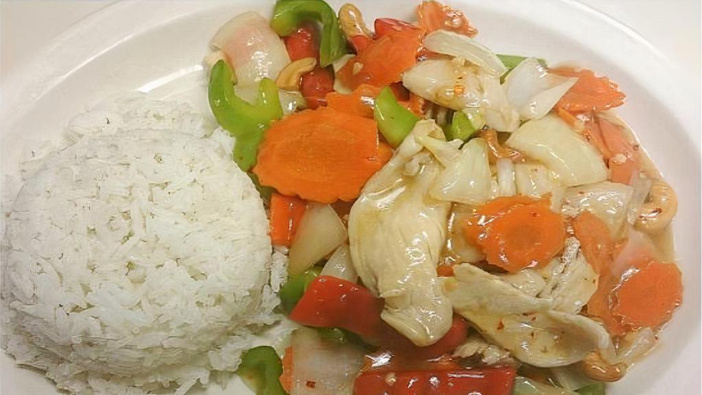 Cashew Nut · Stir-fried with roast cashews, carrots, bell pepper, onion and garlic. Served with rice.